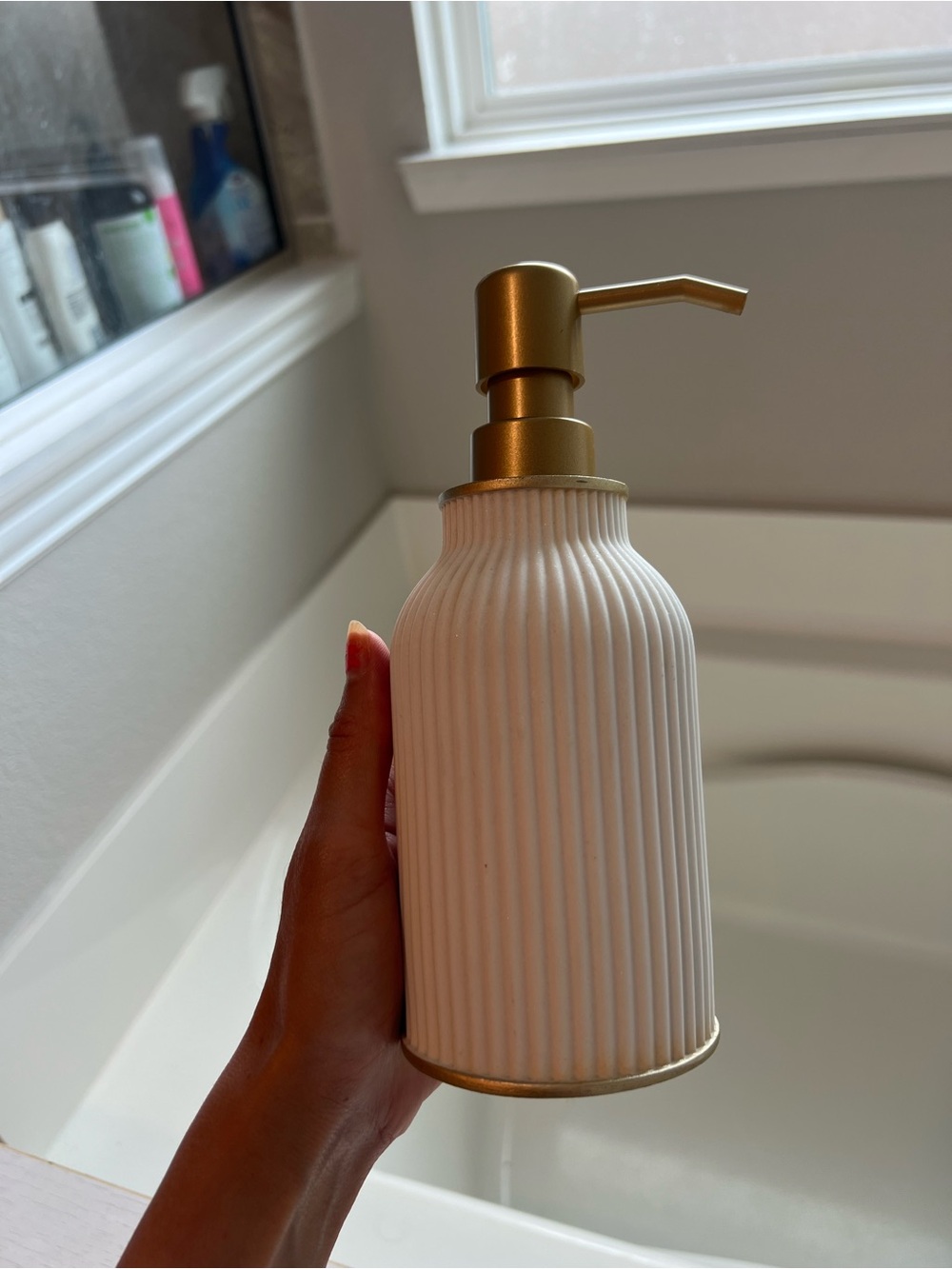 Ribbed White Ceramic Soap Dispenser with Gold Pump